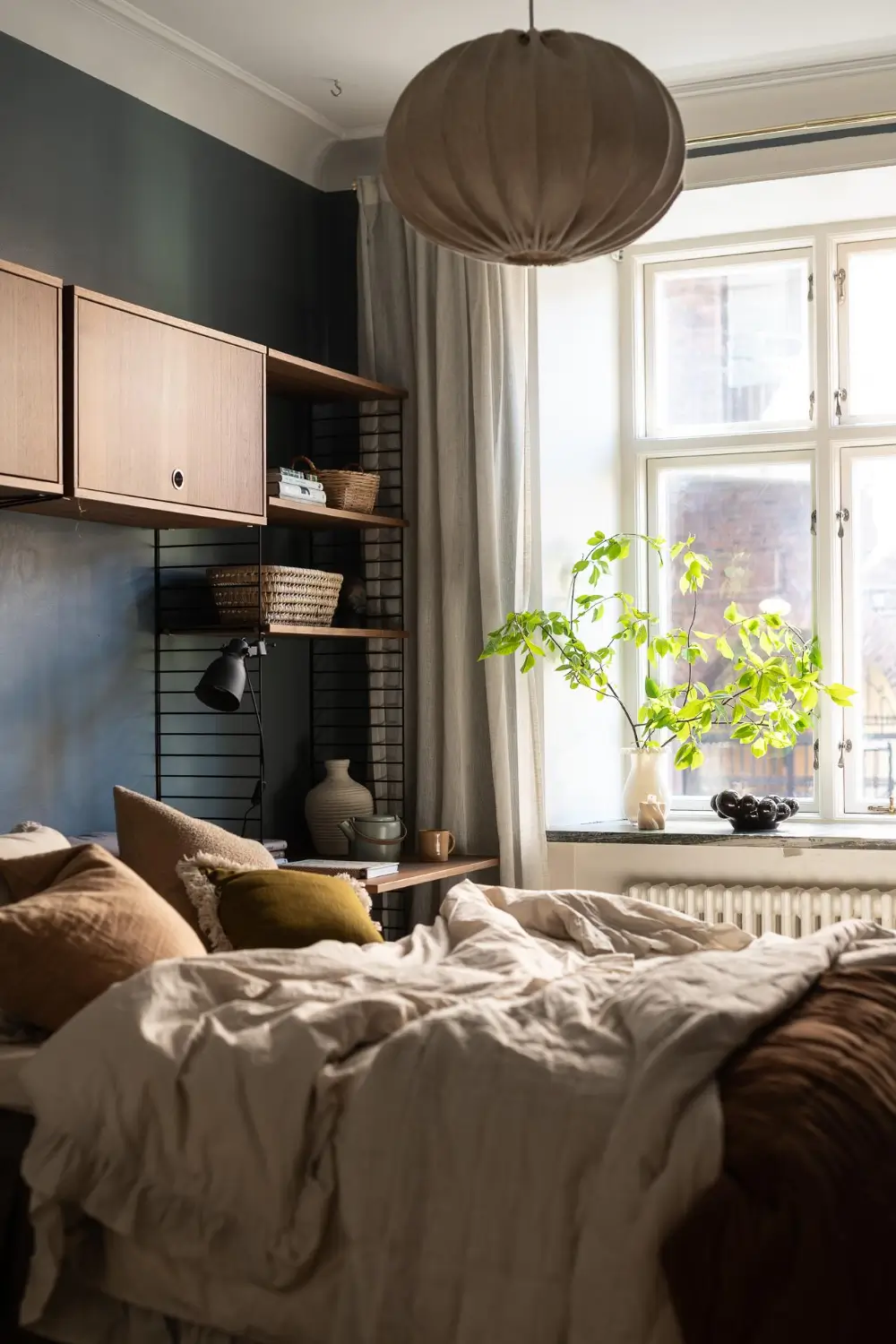 Striped Wallpaper and 1930s Character in a Swedish Apartment 29 cozy-ground-floor-apartment-striped-wallpaper-nordroom