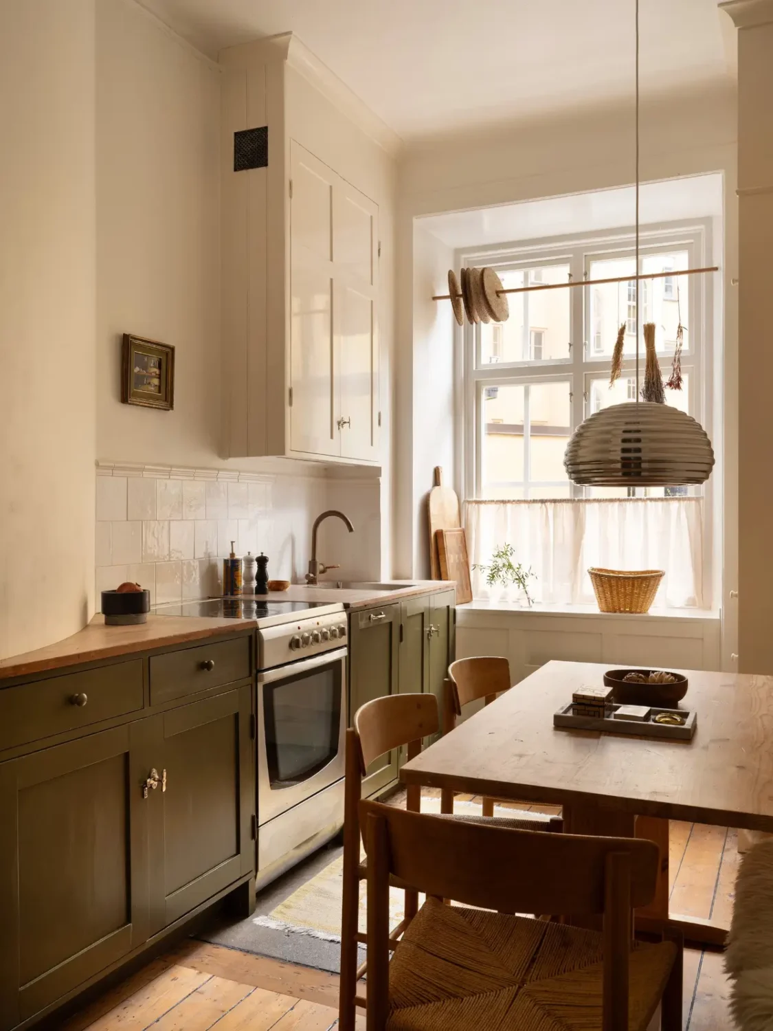Dark Oiled Floorboards and Muted Tones Turn This Apartment Into a Warm Home 8 cozy-stockholm-apartment-green-accents-nordroom