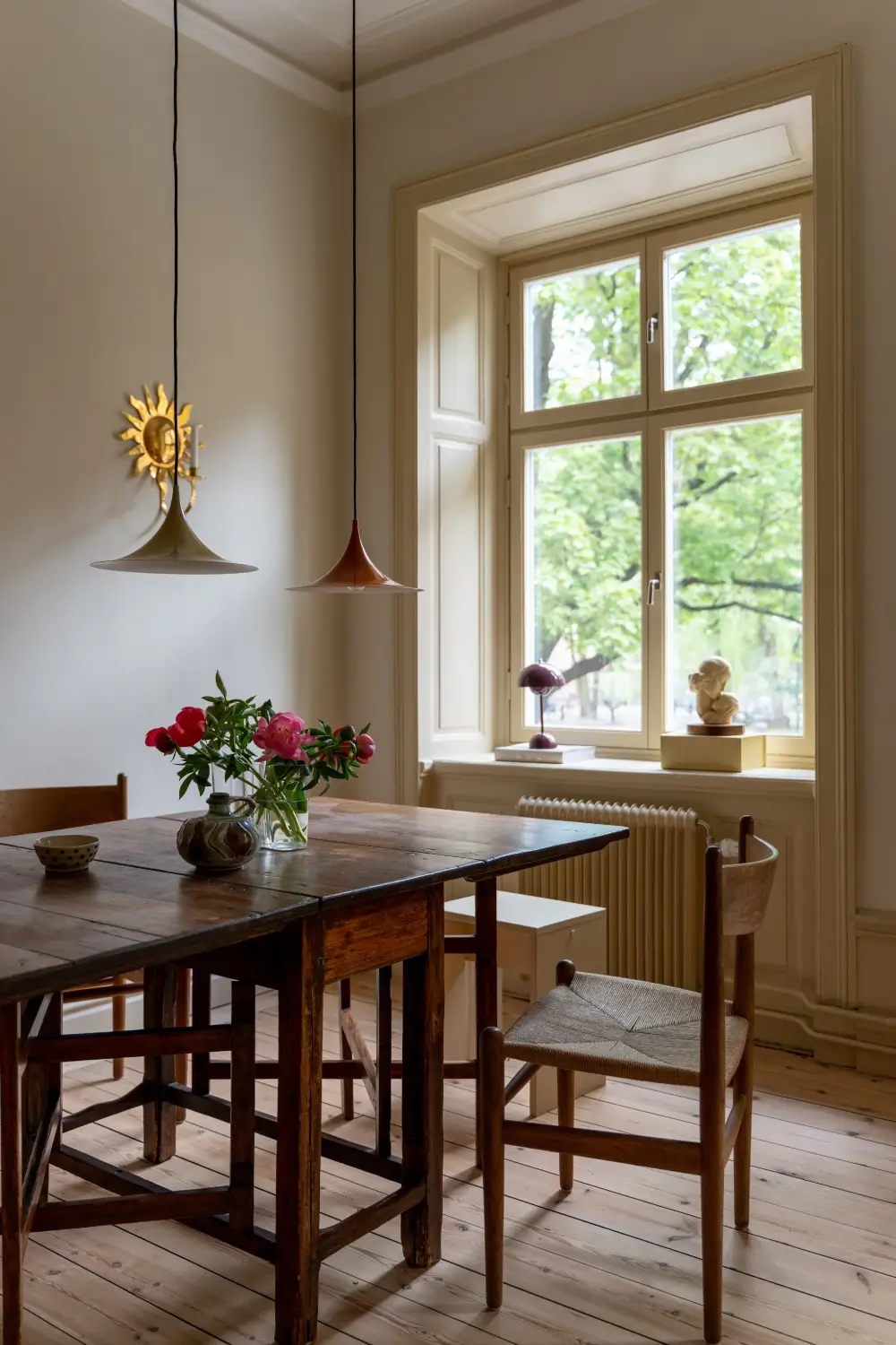 Period Features and Scandinavian Design Furniture in a Serene Stockholm Apartment 4 red-beige-green-tones-19th-century-apartment-stockholm-nordroom