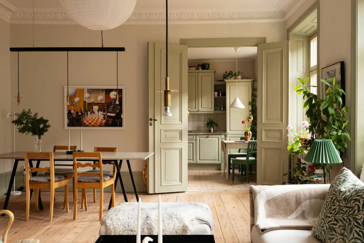 A Muted Green Palette and Period Features in Stockholm 8 sage-green-palette-late-19th-century-apartment-stockholm-nordroom