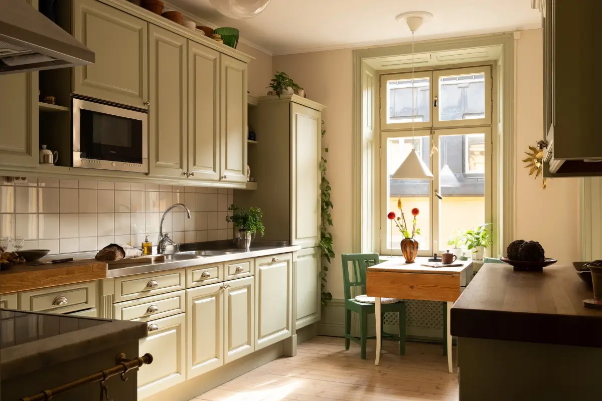 A Muted Green Palette and Period Features in Stockholm 19 sage-green-palette-late-19th-century-apartment-stockholm-nordroom
