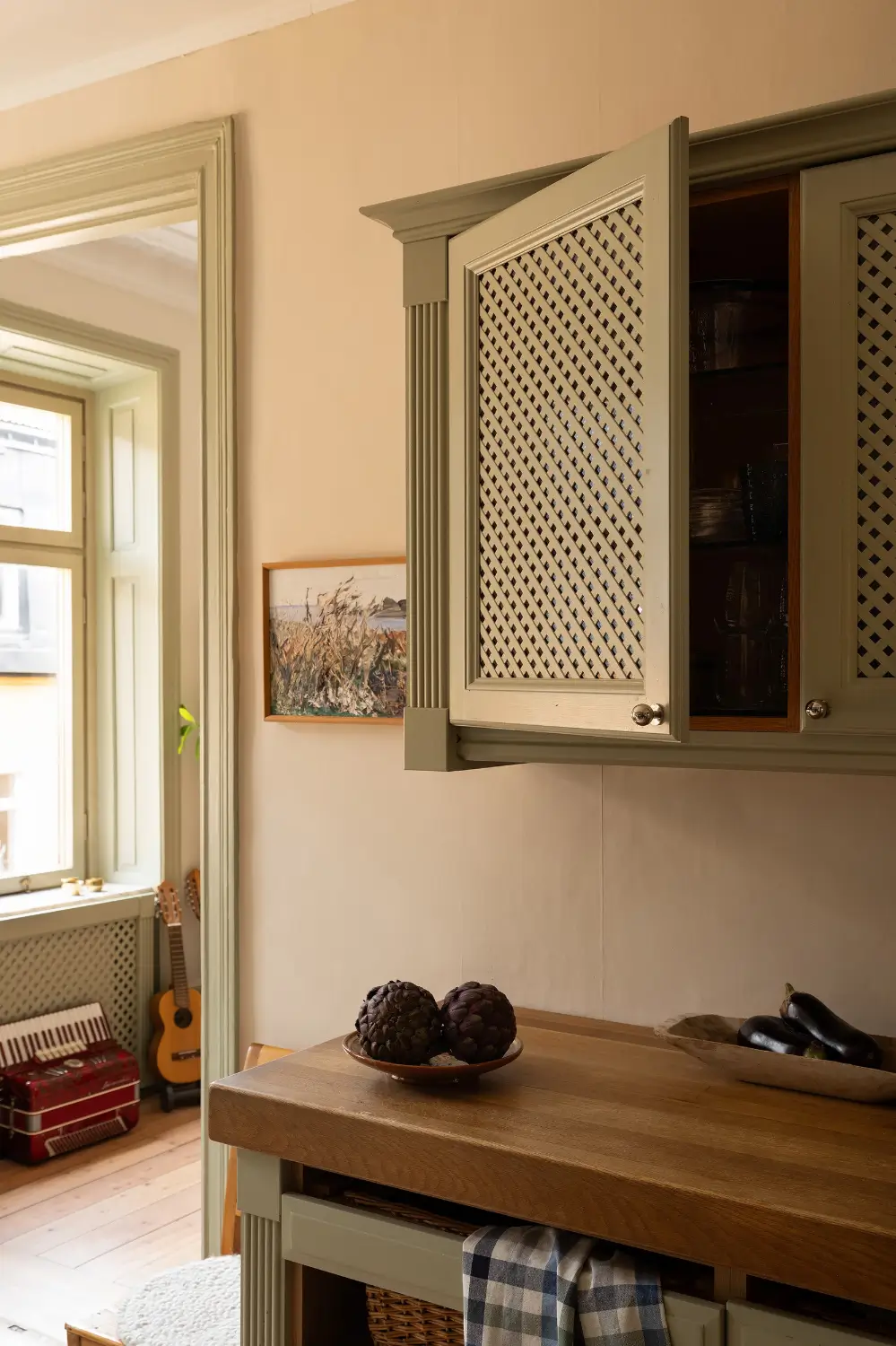 A Muted Green Palette and Period Features in Stockholm 21 sage-green-palette-late-19th-century-apartment-stockholm-nordroom