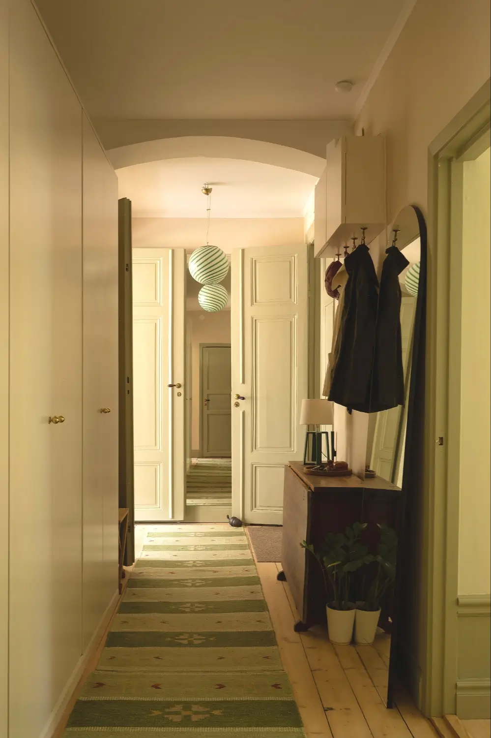 A Muted Green Palette and Period Features in Stockholm 34 sage-green-palette-late-19th-century-apartment-stockholm-nordroom