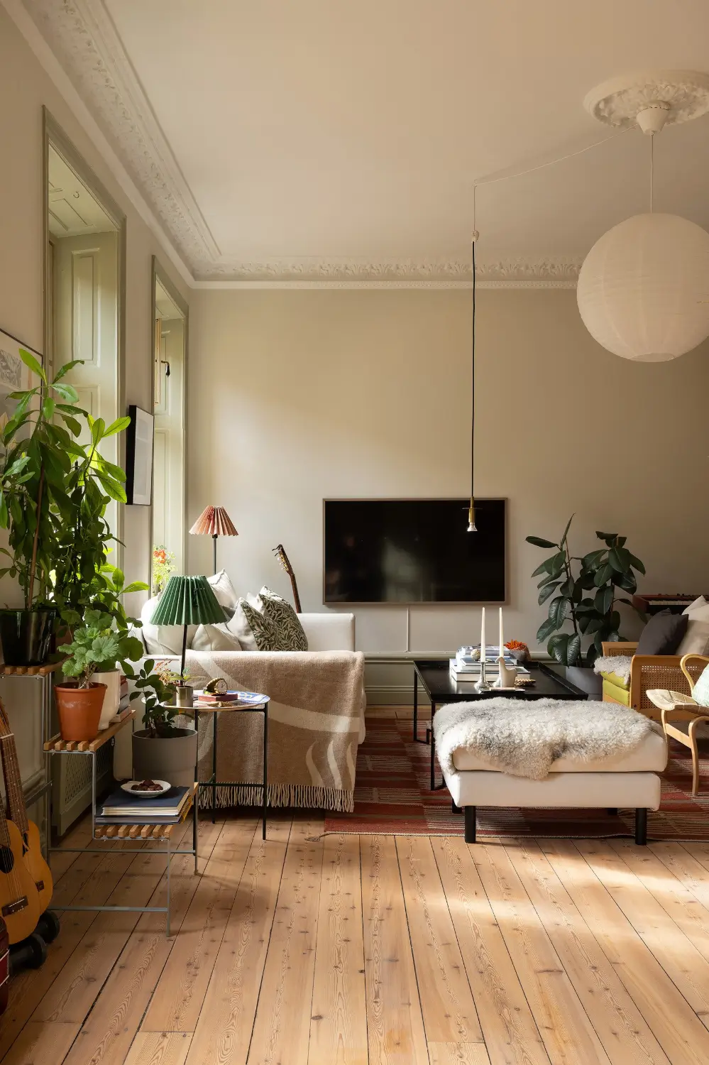 A Muted Green Palette and Period Features in Stockholm 3 sage-green-palette-late-19th-century-apartment-stockholm-nordroom