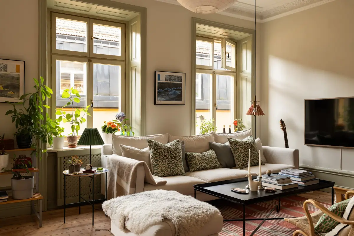 A Muted Green Palette and Period Features in Stockholm 4 sage-green-palette-late-19th-century-apartment-stockholm-nordroom
